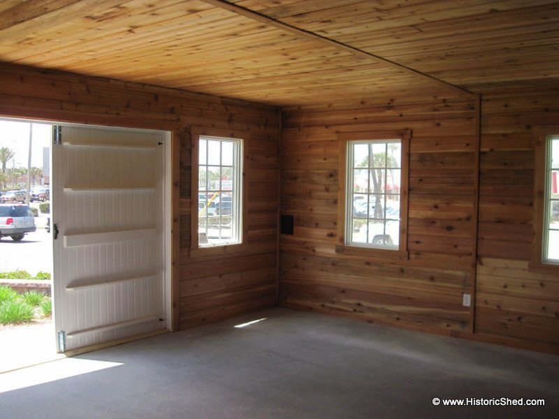 The garage interior was finished with grooved cedar boards.